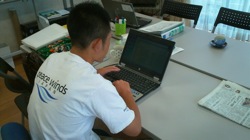 PWJ Staff using donated laptop