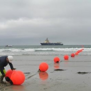 Workers begin laying the ACE submarine cable in Penmarc'h, France, October 2011